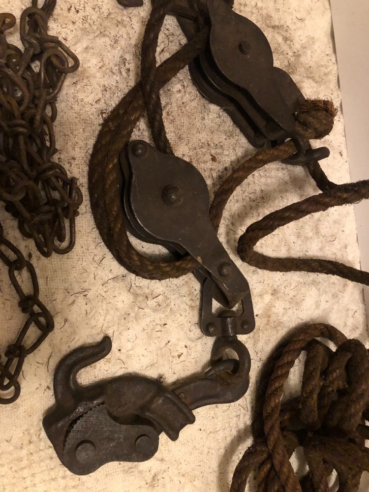 Antique primitive rope and chain hoist