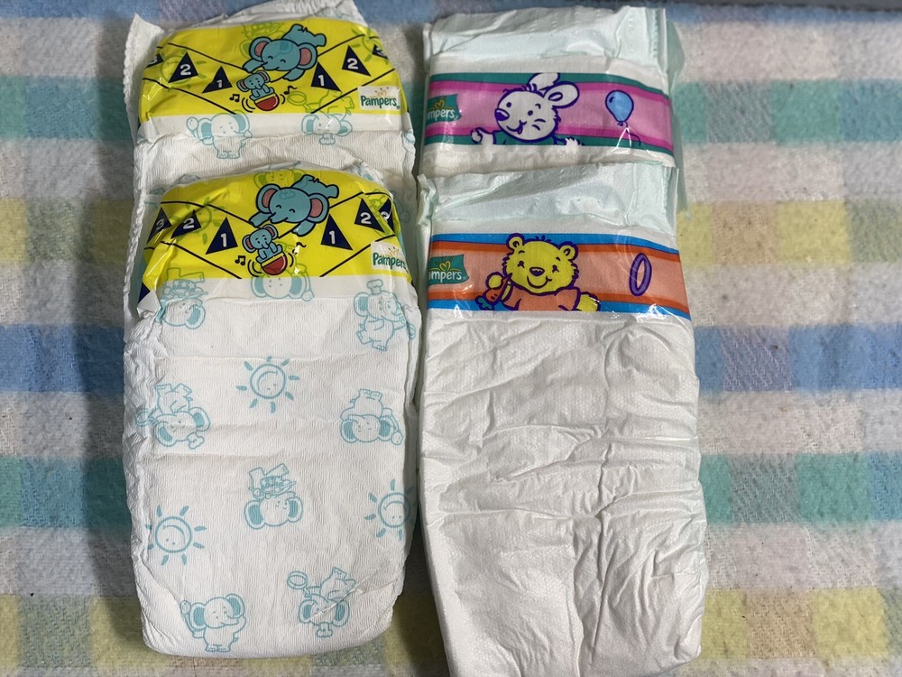 Vintage Tape Tab diapers Medium/Large 4 Count