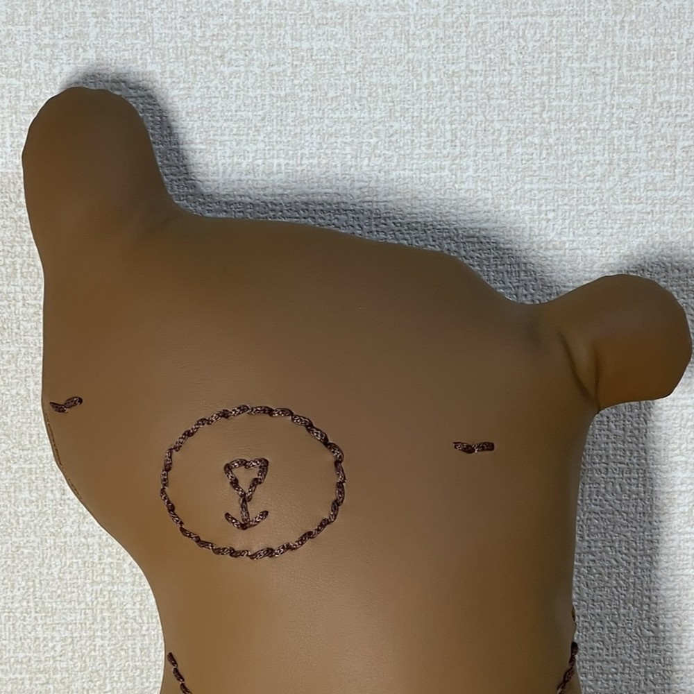 Handcrafted leather teddy bear that can chat in several languages