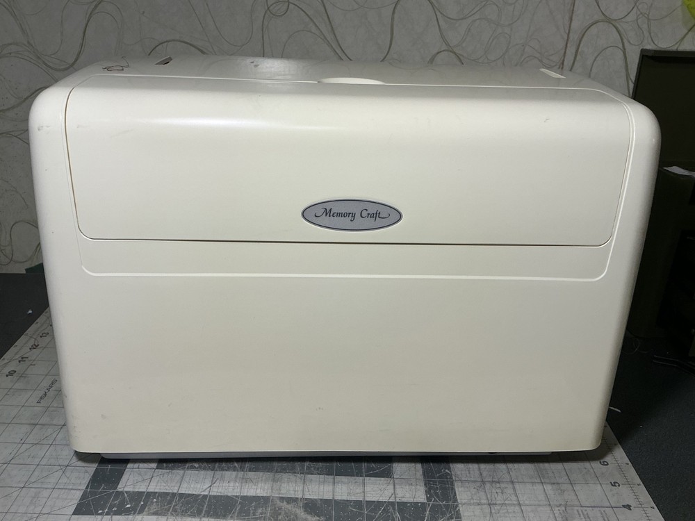 Janome Memory Craft 9000 Computerized Sewing and embroidery machine.