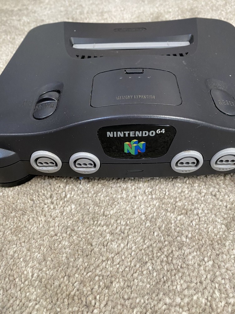 nintendo 64 console with hookups and 1 controller