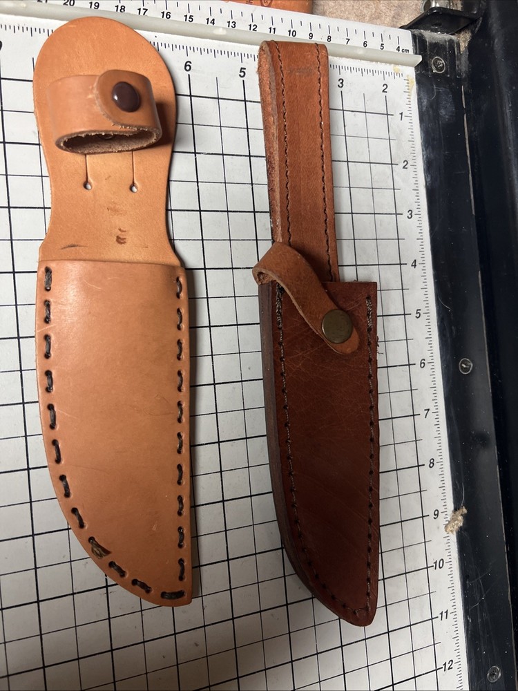Two Unbranded Leather Sheaths