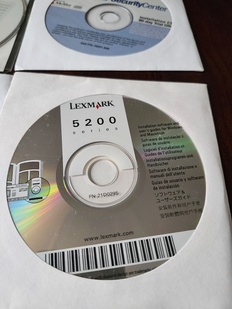assorted computer installation and program discs