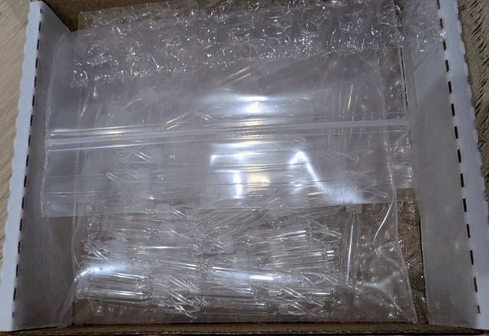 NEW Waters Deactivated Clear Glass Insert, 150 µL Volume with Polyspring, 100/pk