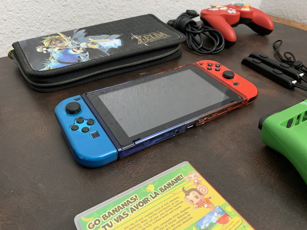 Nintendo Switch Console With A Bunch Of Stuff