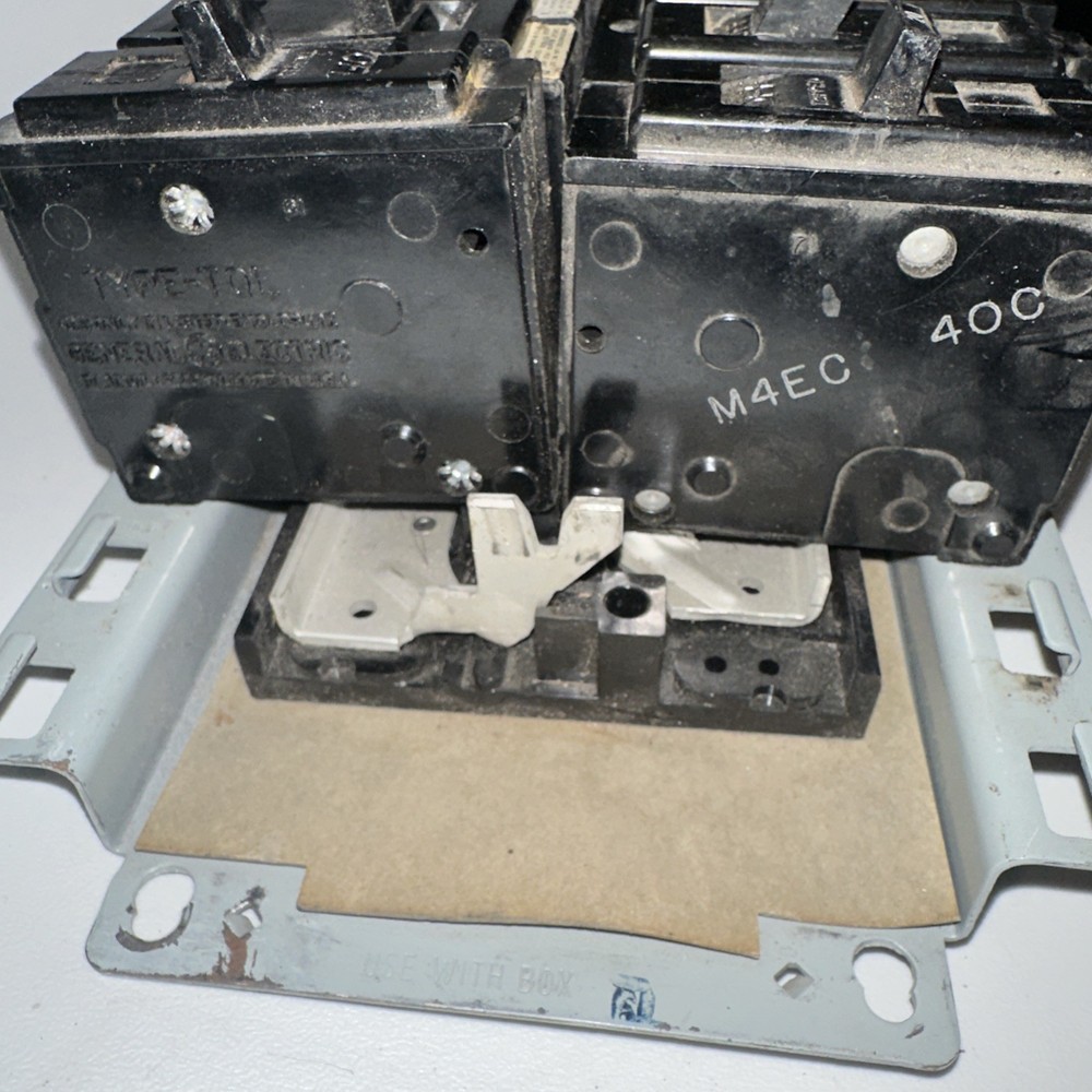 Electrical Load Center, service panel interior containing GE circuit breakers