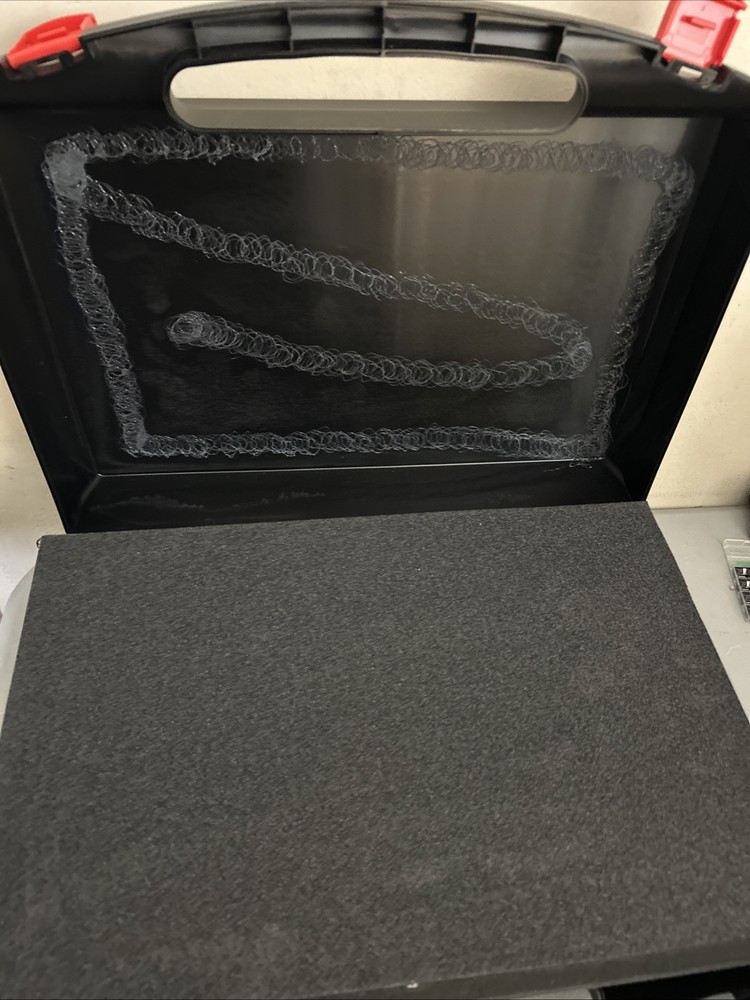 Plastic portable storage or tool box with red snap locks