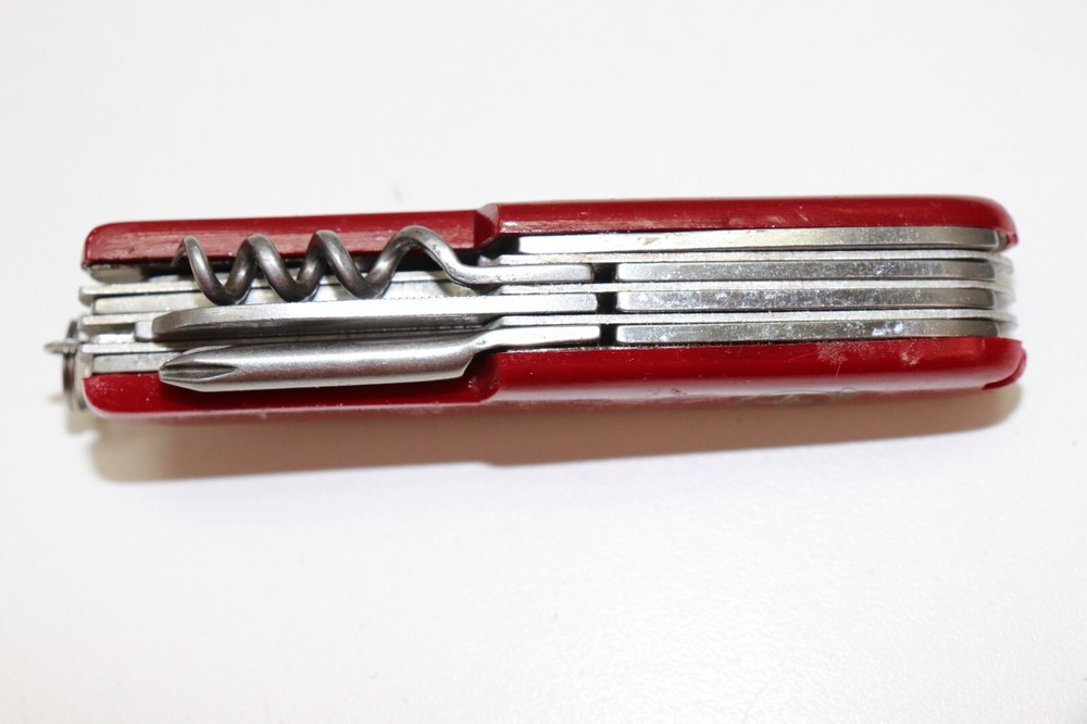 Rostfrei Pocket multitool red plastic handles gold mark E633