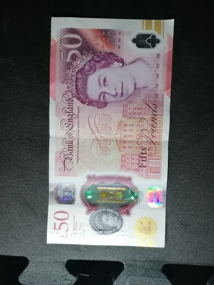 AA 50 pound note. VERY GOOD CONDITION AND THE EARLIEST IF RUNS!!