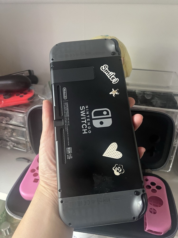 Nintendo Switch Console w/ Joy-Con, Grip, tomtoc Case, Thumb Grips