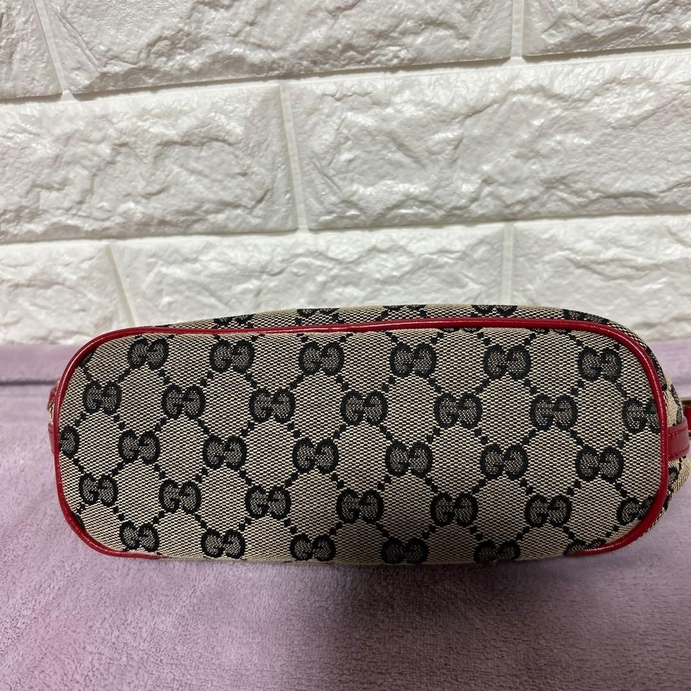 Gucci Accessory Pouch GG Canvas Handbag