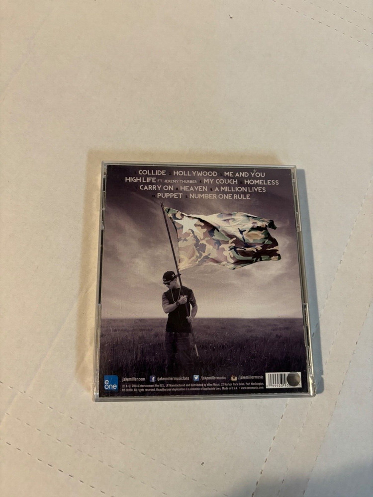 JAKE MILLER SIGNED AUTOGRAPH CD US AGAINST THEM