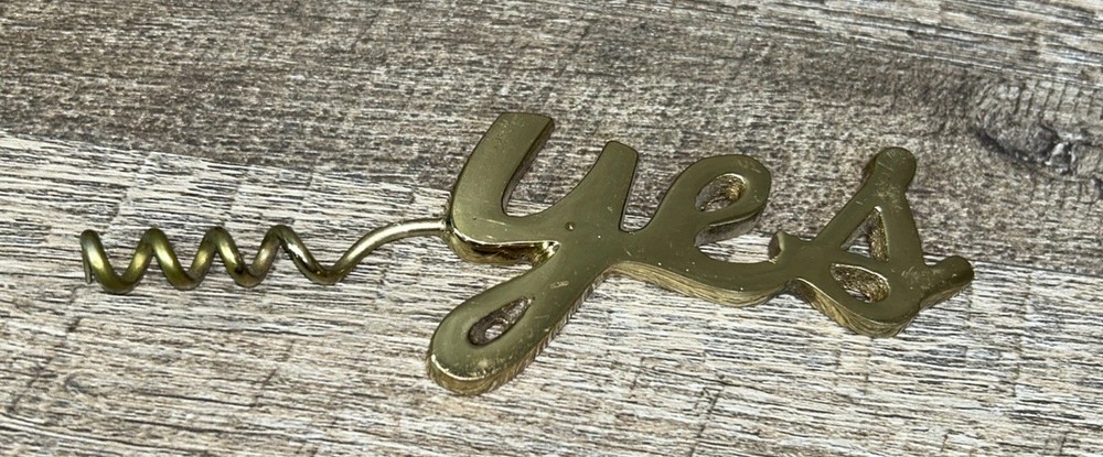 Brass Corkscrew With The Word Yes Spelled Out