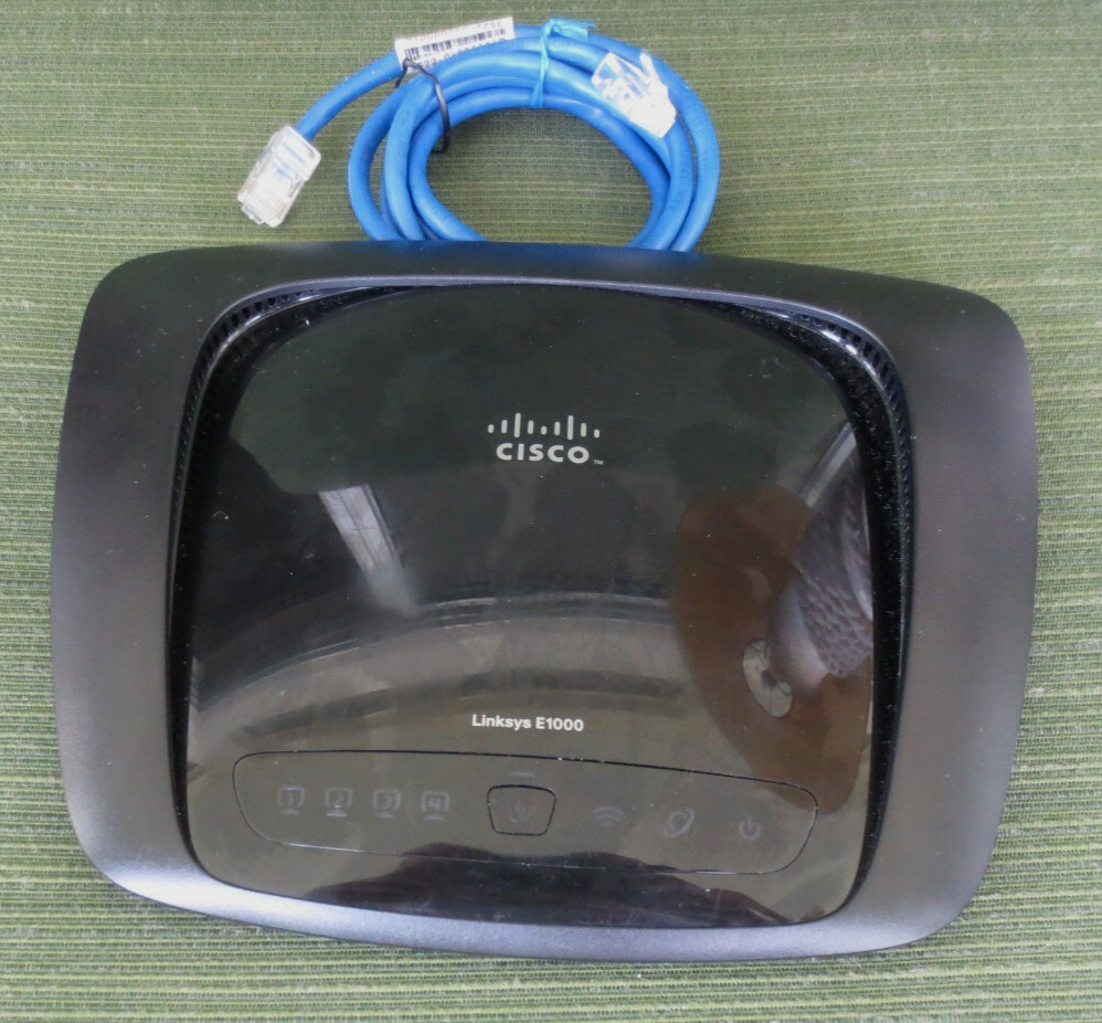 CISCO LINKSYS E1000 4 PORTS + INTERNET