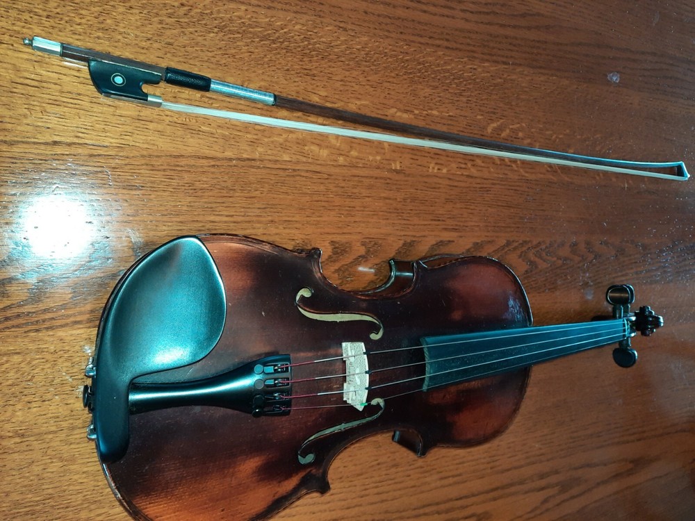 100 year old German violin with a vuillaume bow