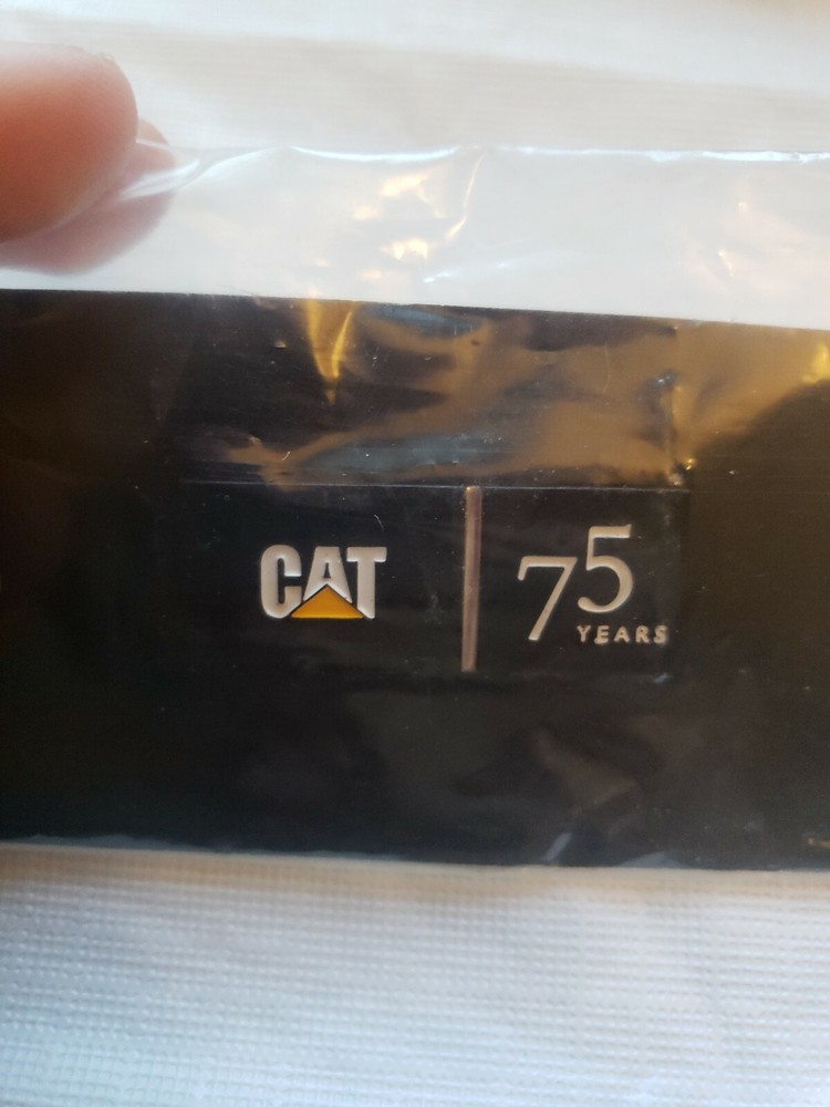 CAT 75 Years Pin