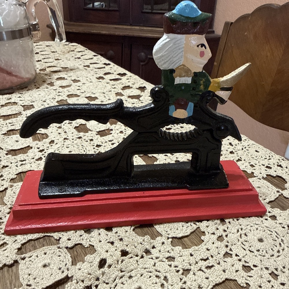 Vintage Heavy Cast Iron Nut Cracker On Red Wood Base Nutcracker Soldier