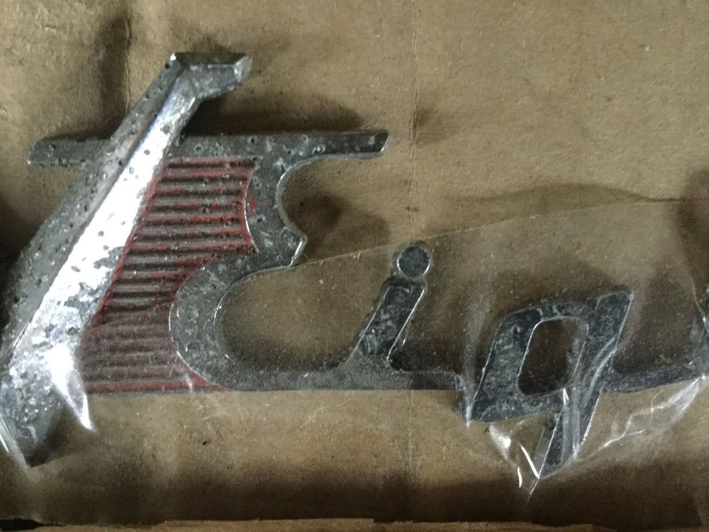 1953 1954 Dodge V Eight Trunk Badge pair one solid one pieces complete