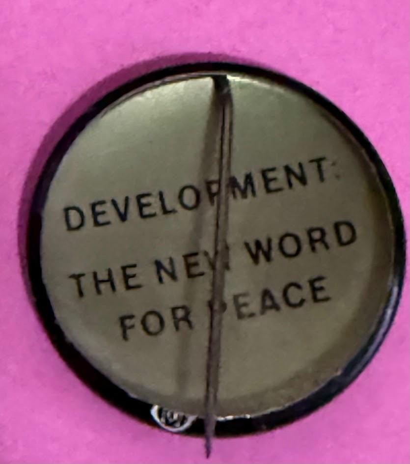 Vintage "Development - The New Word for Peace" Button.