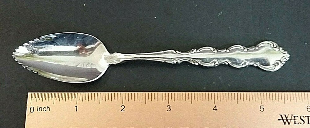 Oneida Mozart stainless grapefruit/orange spoon 6" long