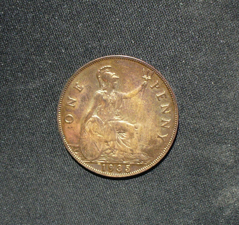 Two Old UK Pennies