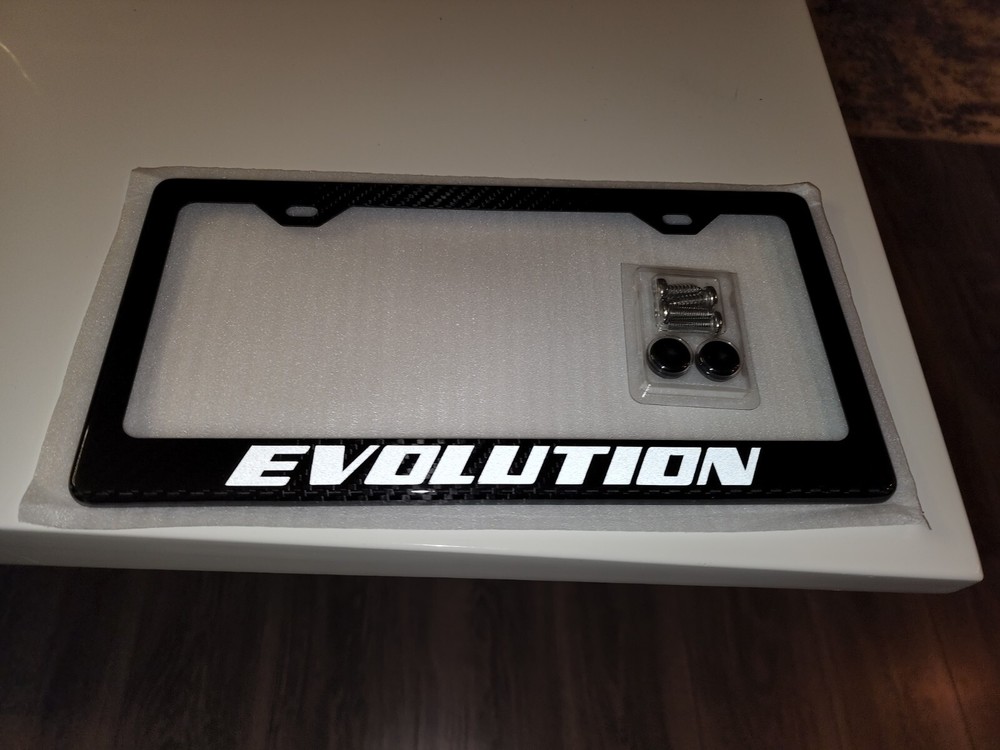 Reflective White Lacer Evo / Evolution 100% Carbon Fiber License Plate Frame