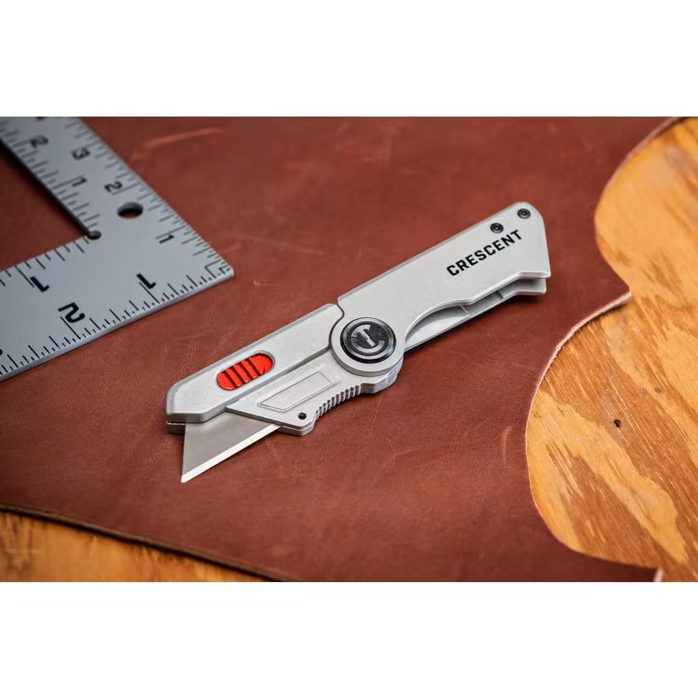 Compact Folding Utility Knife with Quick Change Blade