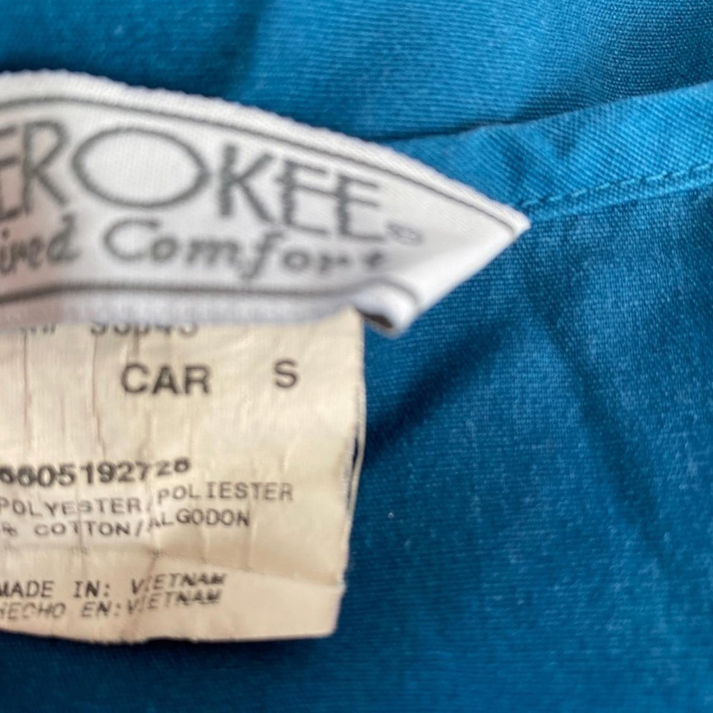 Woman's Teal color scrub Jacket Size S