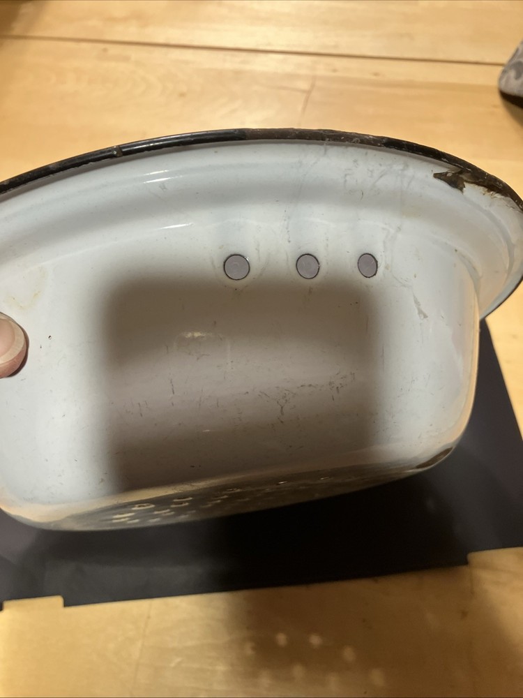 white enamelware colander