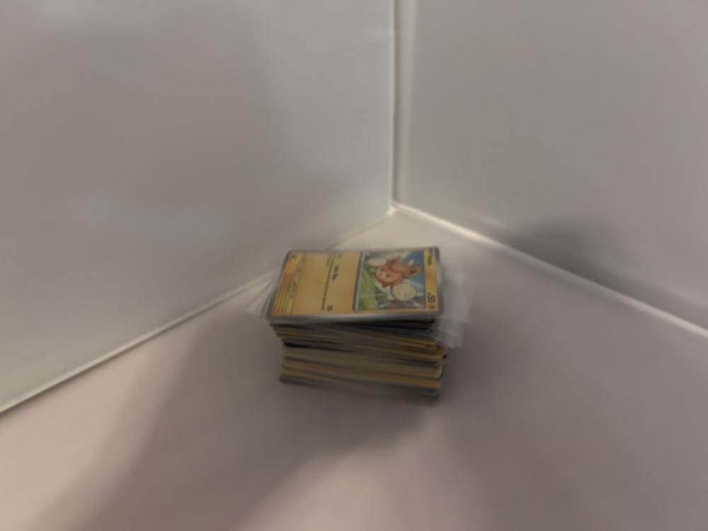Unsorted assortment of 100 Pokémon cards ￼-all basic cards-￼