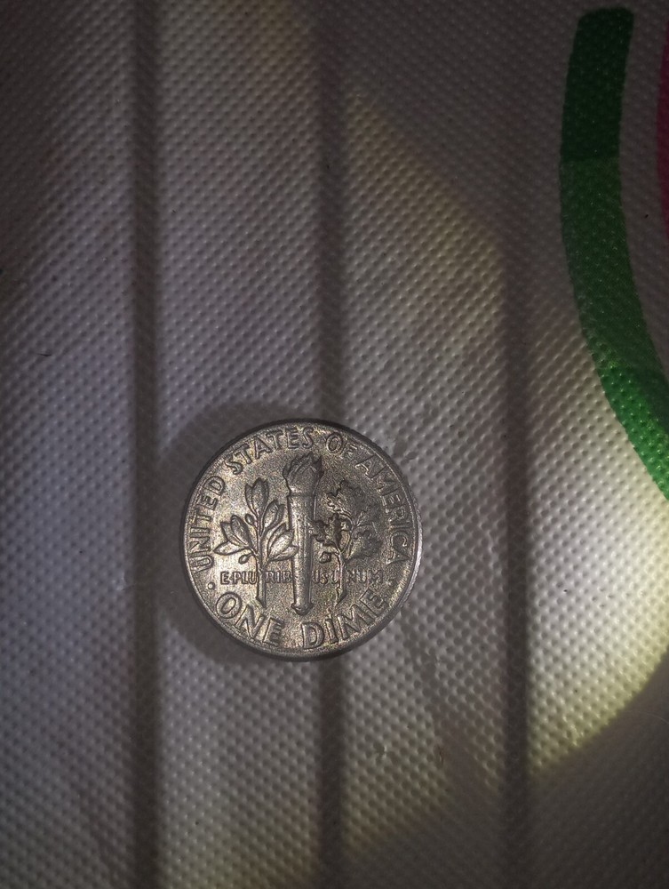 1976 d dime error off center observe