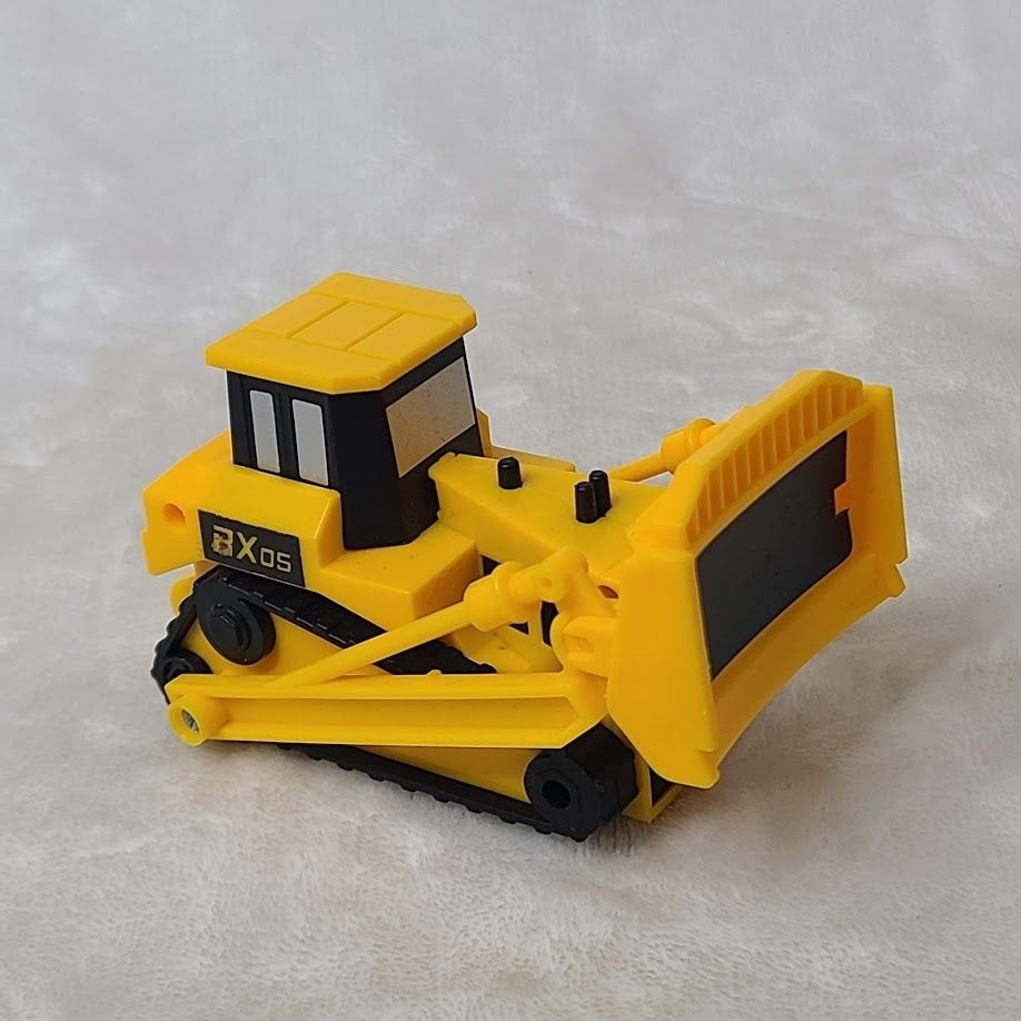 Yellow Plastic Toy Bulldozer With Movable Front Blade