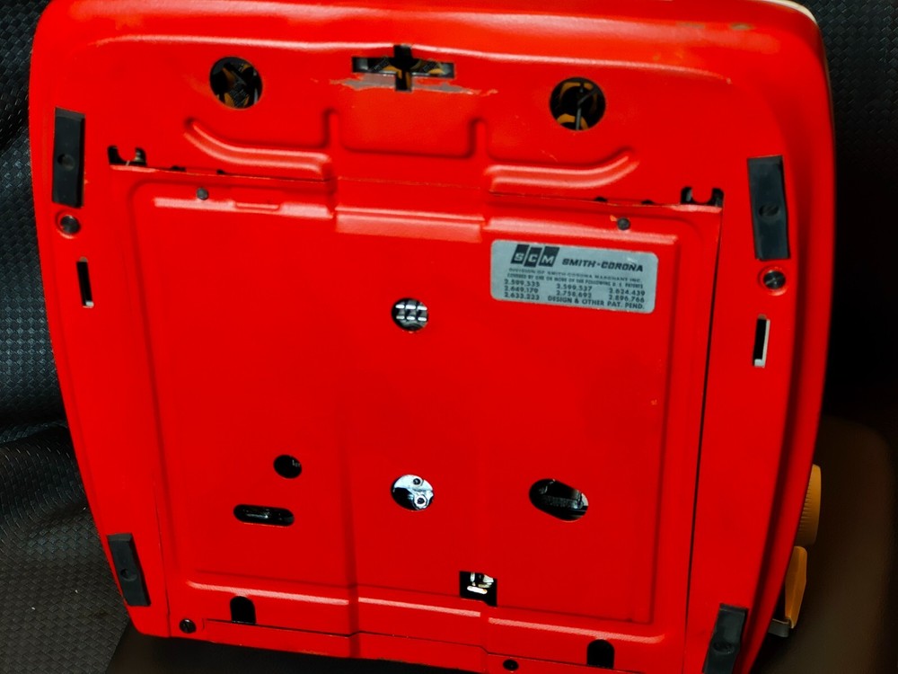 red, portable Smith Corona Galaxie typewriter with Cursive / Handwritten Script