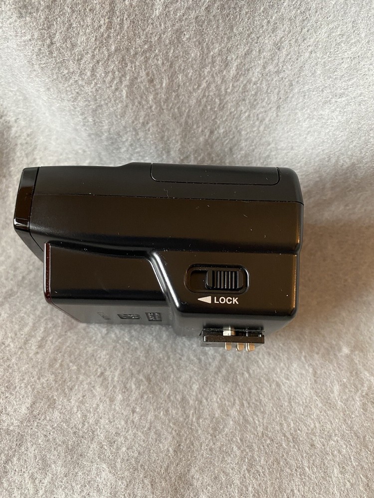 Canon Speedlite Transmitter ST-E2 And Book