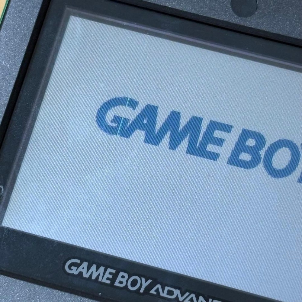 Game Boy Advance SP Green + 4 Games