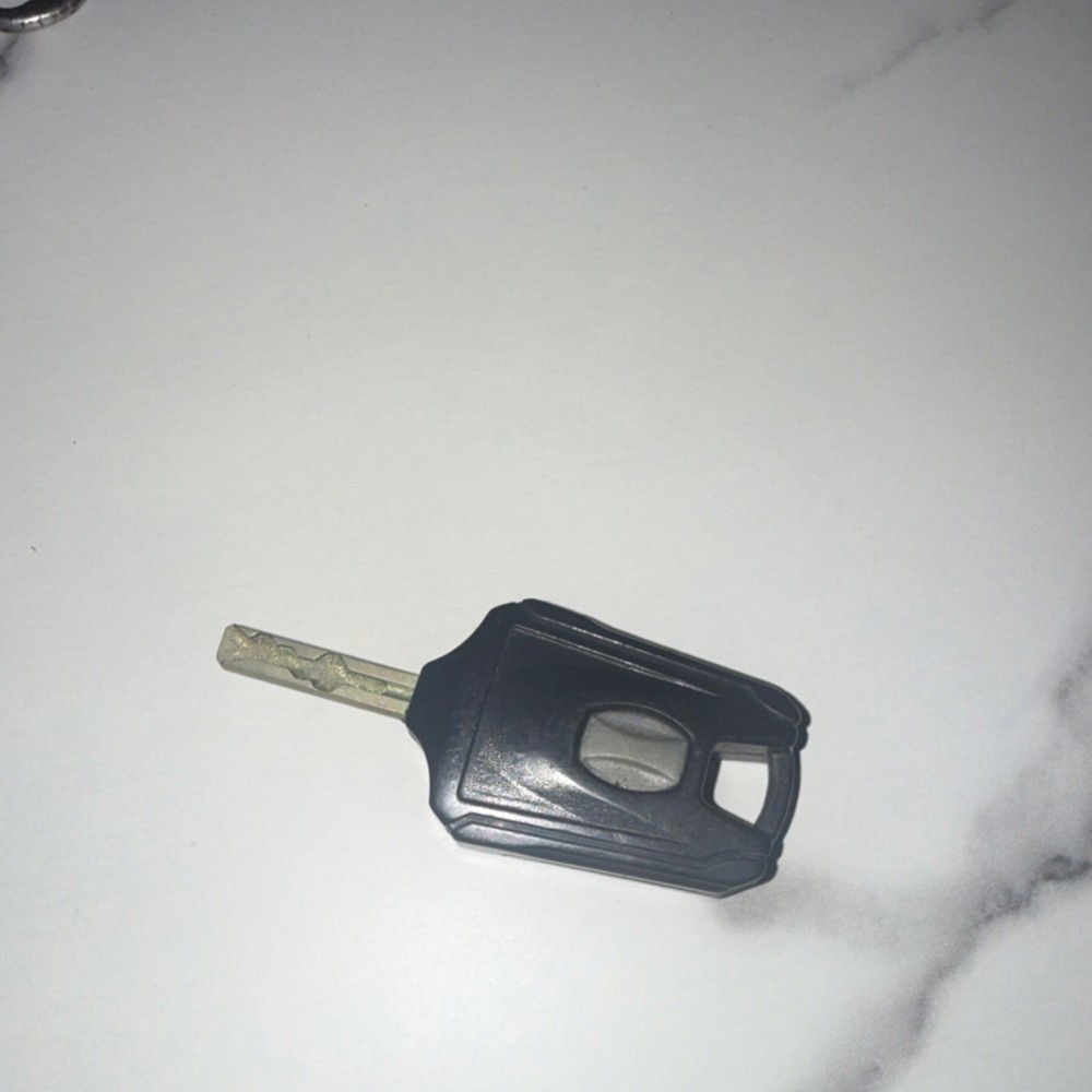Unbranded Scooter Key With Small Light