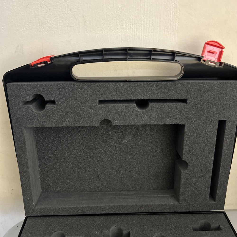 Plastic portable storage or tool box with red snap locks