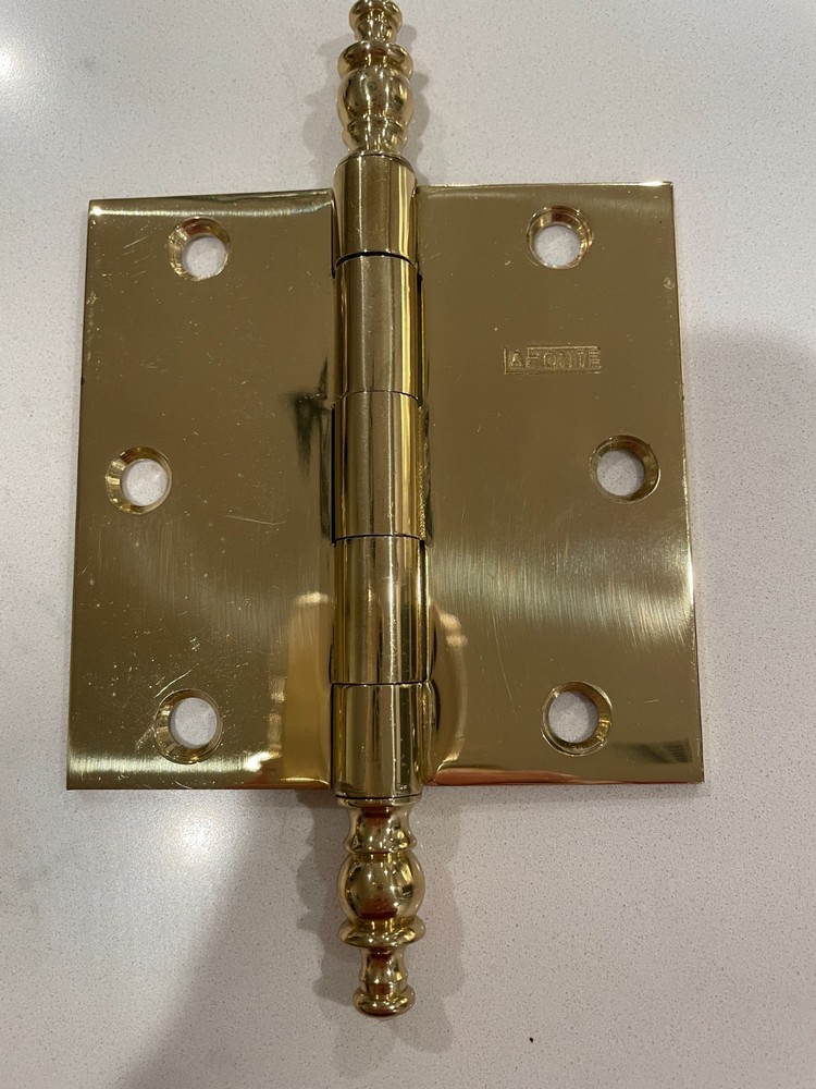 A pair of LaFonte solid brass steeple hinges, polished