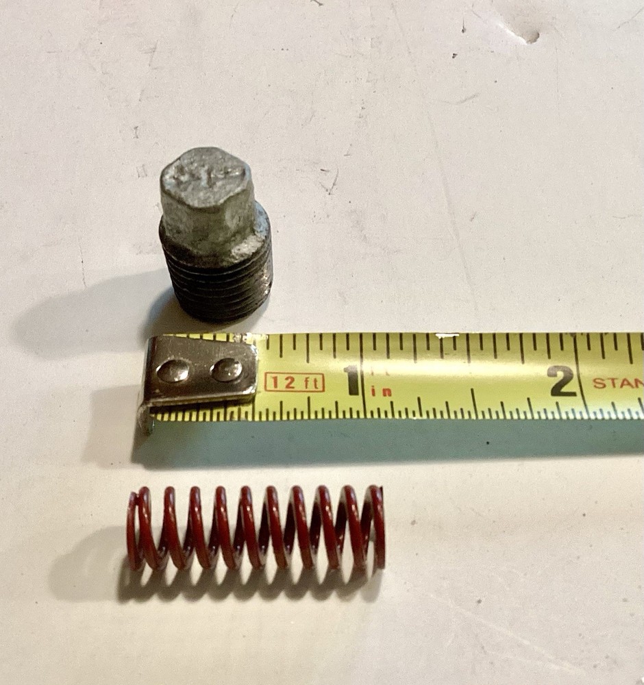 Troy Bilt Horse depth regulator spring and plug.