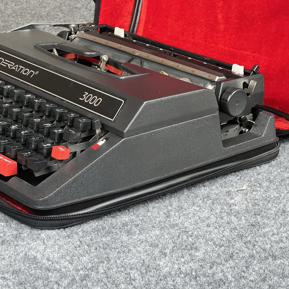 Generation 3000 Manual Typewriter with Case and Paperwork