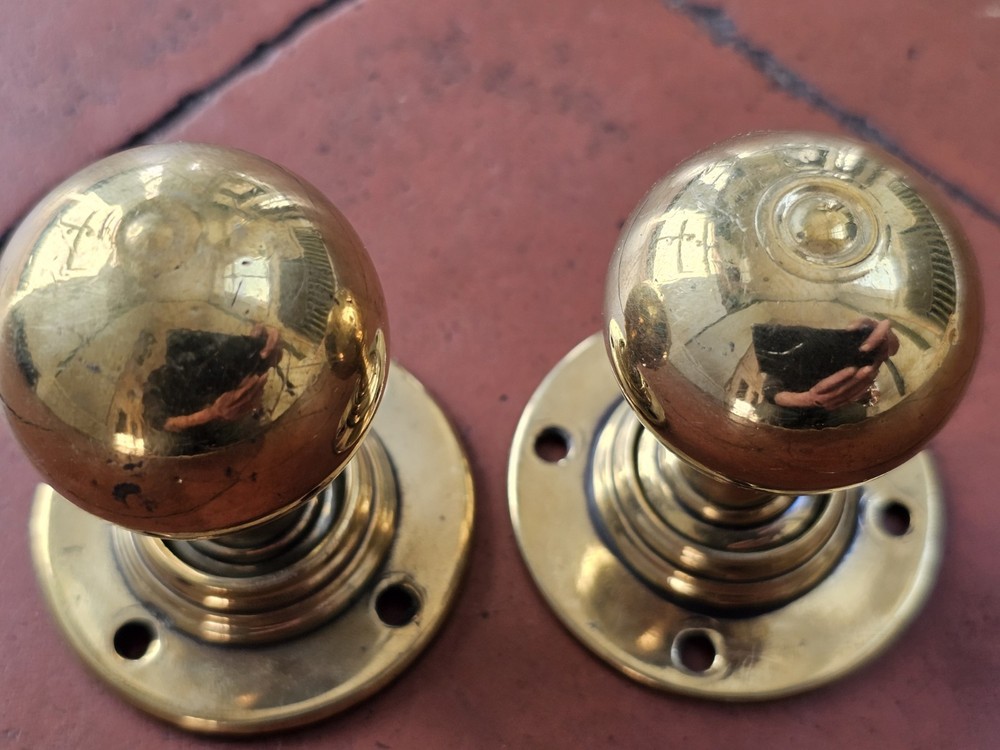 Antique original brass door knobs