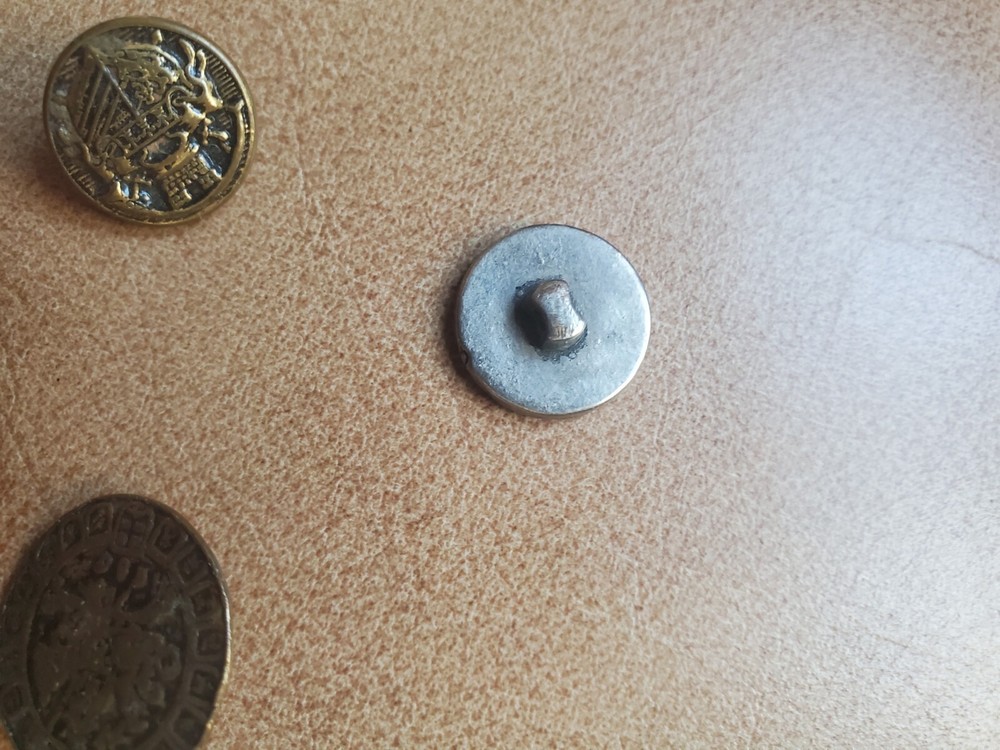 4 miscellaneous antique brass buttons