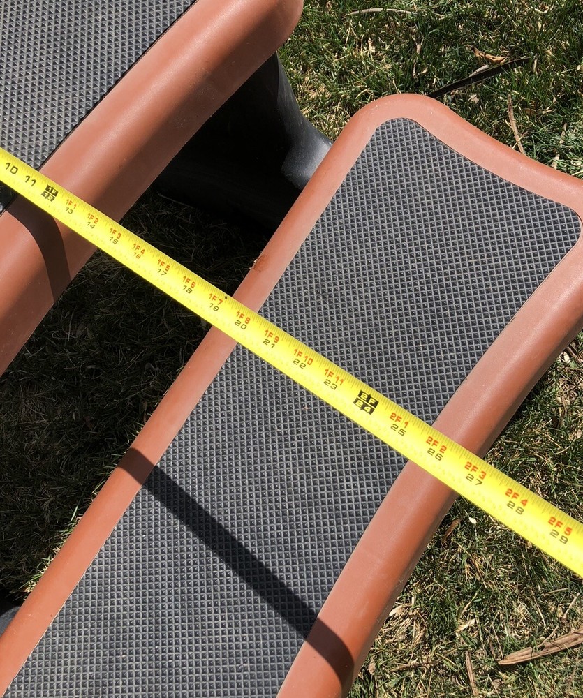 hot tub / spa steps in rust colored plastic..