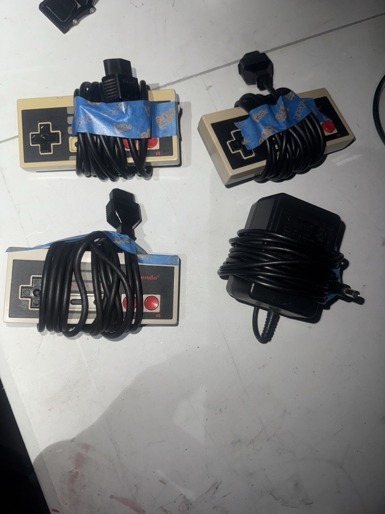 Nintendo Ac Plug And 3 Controllers