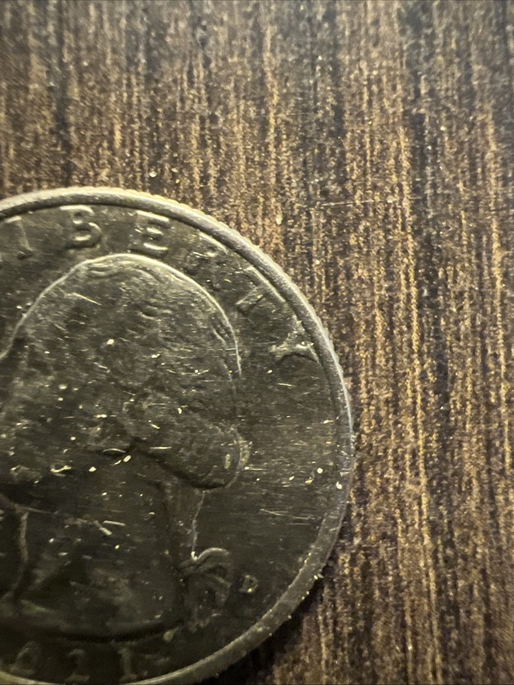 “25 cents USA mint error”