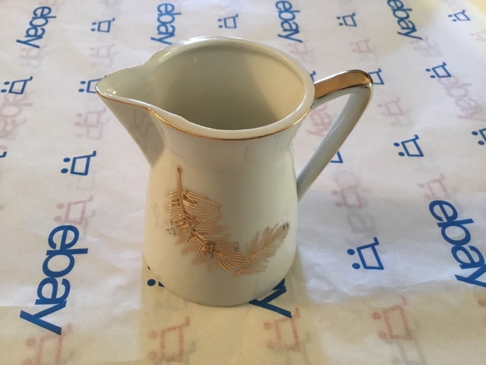 Small lefton pitcher #535