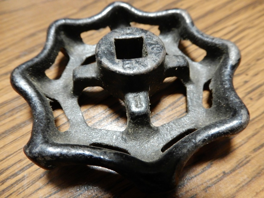VINTAGE BLACK CAST IRON HANDLE APPROX 2 3/4" WIDE