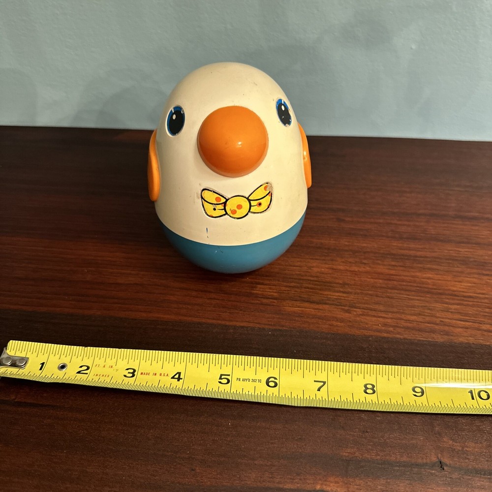 Vintage Musical Roly Poly Penguin pull behind toy