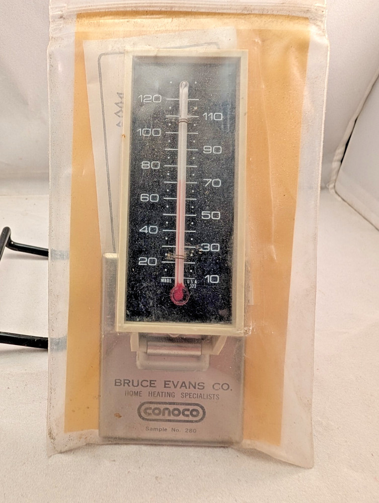 NOS Bruce Evans Co home Heating specialists Conoco sample sign thermometer