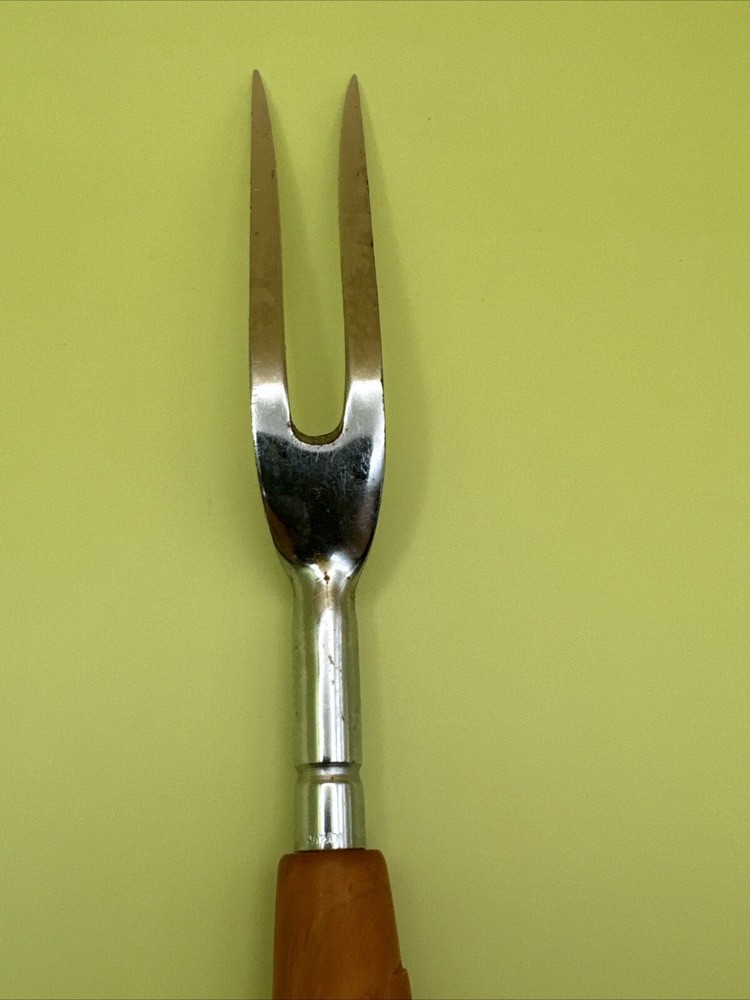 9.5” Vintage bakealite handled MCM meat Fork